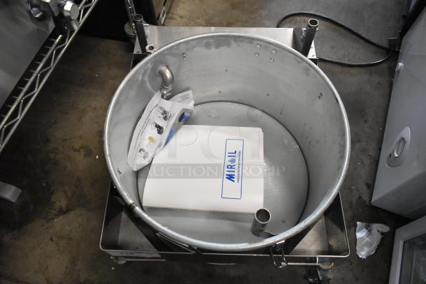 BRAND NEW SCRATCH AND DENT MirOil 55 lb. Fryer Oil Filter Machine by Avantco, model 184T3600D, includes manual and accessories.