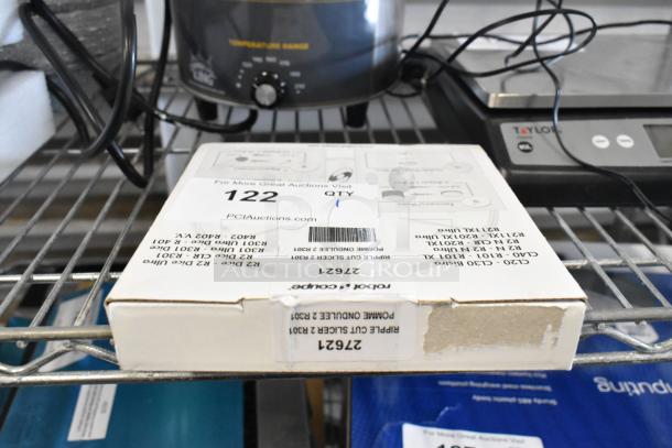 Brand new Robot Coupe 27621 5/64" ripple cut disc, slight box damage. Model label visible, sealed packaging.