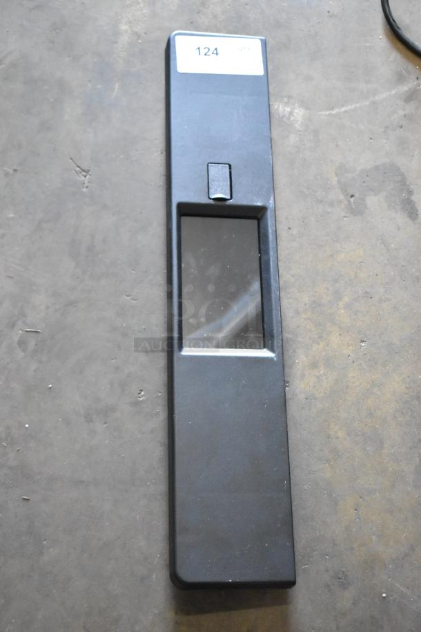 Black MXP Core unit with visible scratches, dented edge. Label "124 QTY 01" on top. Brand new, model 20269125Q.