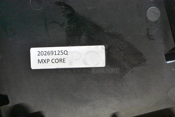 "Brand new MXP Core with label '20269125Q MXP Core', minor scratches visible, indicating scratch and dent condition."