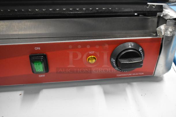 Brand new 2023 Avantco 177PG200 panini grill, grooved plates, 13 3/8" x 8 3/4" surface, 120V, 1 phase, visible controls.