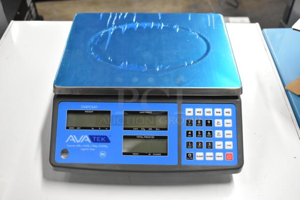 Two AvaTek digital price computing scales, models PCS60 and PCS40, brand new, legal for trade, with LED displays.