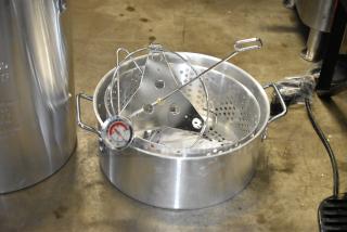 BRAND NEW SCRATCH AND DENT Backyard Pro metal fryer pot with handles, thermometer, and perforated basket.