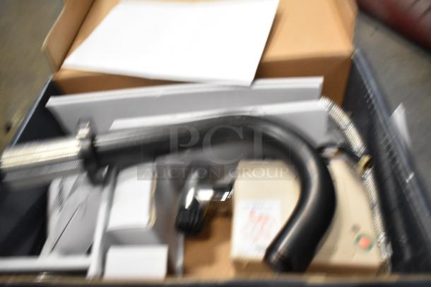 Two new Waterloo hands-free sensor faucets, one wall-mount, one deck mount, each with gooseneck spouts; some scratches.