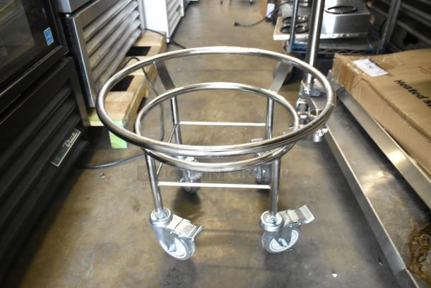 Brand new metal commercial bowl dolly with scratch and dent marks, featuring sturdy commercial casters.