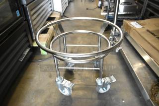 Brand new metal commercial bowl dolly with scratch and dent marks, featuring sturdy commercial casters.