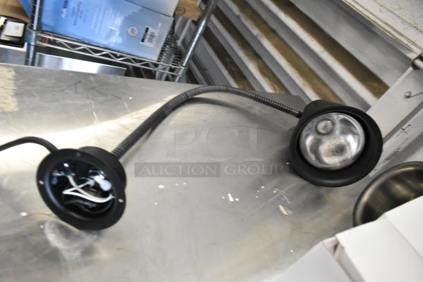 Two brand new metal heat lamps, models CK2514E008 and CK2510D237, scratch and dent condition.