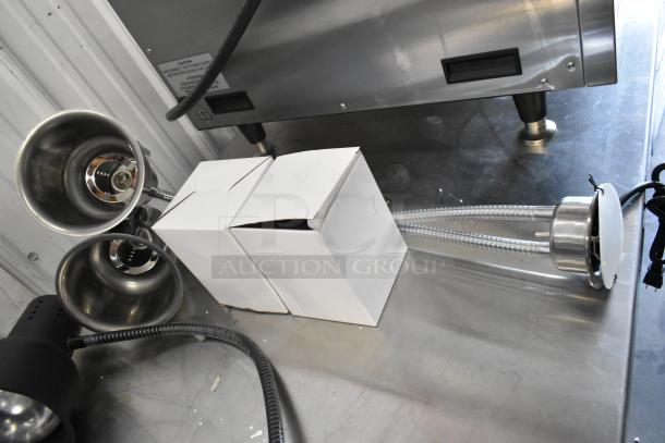 Two brand new scratch and dent CK2514E008 and CK2510D237 metal heat lamps, with boxes.