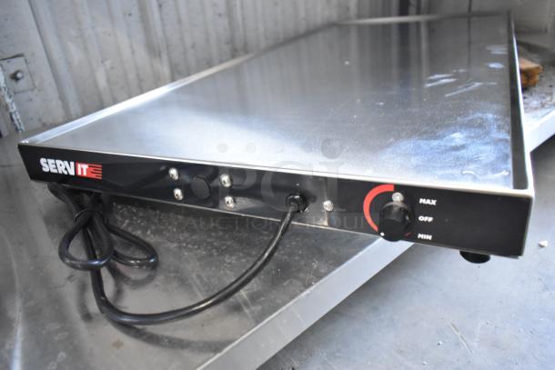 2 new ServIt stainless steel heated shelf warmers, models 423HSW2042 and 423HSW2036, shown in scratch and dent condition.
