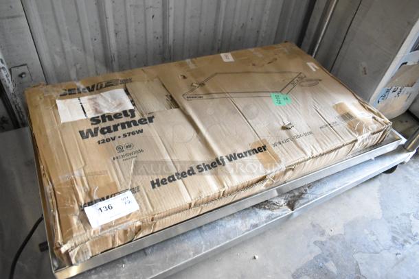 2 brand new ServIt heated shelf warmers, models 423HSW2042 (42") and 423HSW2036 (36"), in original packaging.