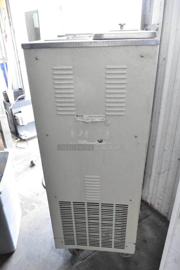 Alpine OP238EC soft serve ice cream machine, metal, two flavors with twist, on commercial casters. 115 volts, 1 phase.