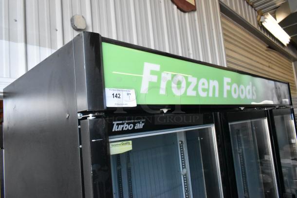 Turbo Air TGF-72SDB 3-door cooler merchandiser, metal construction, poly-coated racks, 115V, 1 phase, labeled "Frozen Foods".