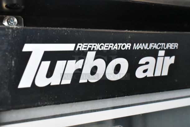 Turbo Air TGF-72SDB label on commercial cooler, showing brand name and manufacturer.