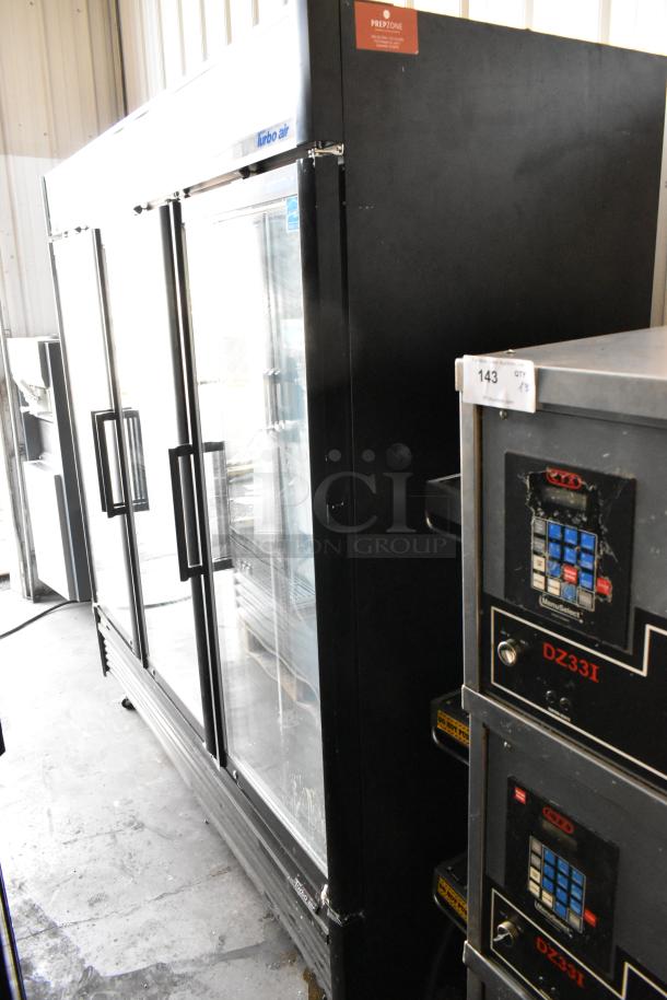 Turbo Air TGF-72SDB 3-door reach-in cooler merchandiser with poly coated racks, metal exterior, 115V, 1 phase.