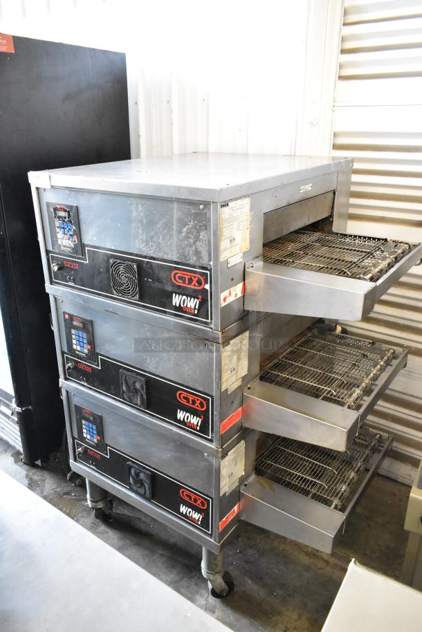 Middleby Marshall CTX DZ33I stainless steel electric conveyor pizza oven, on commercial casters, 208V, 3/1 phase.