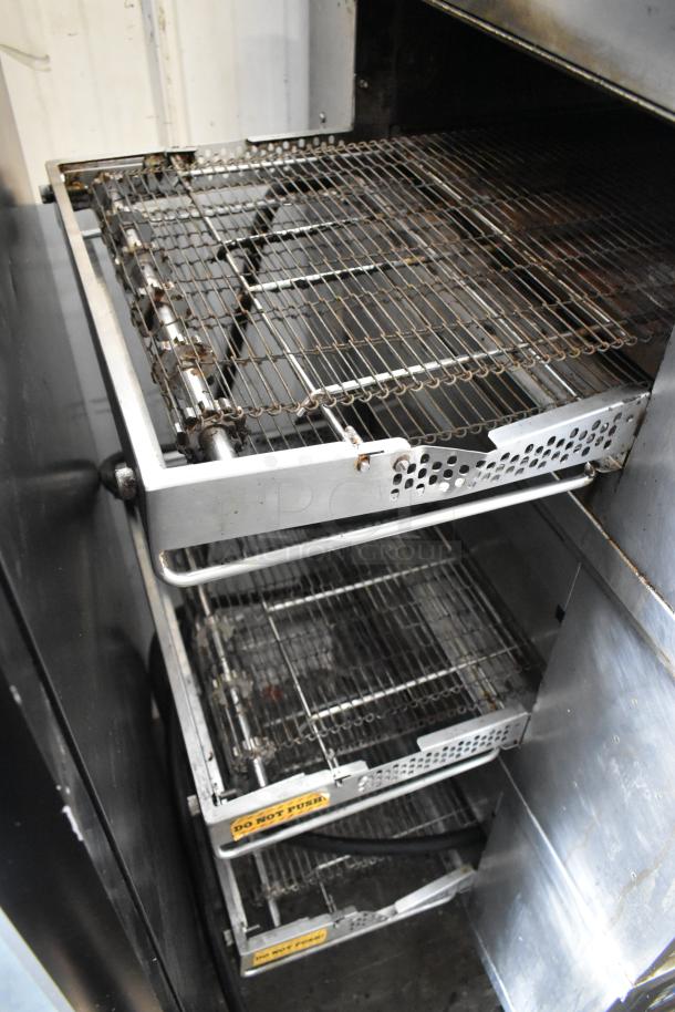 Middleby Marshall CTX DZ33I conveyor pizza oven, stainless steel, electric, 208V, on casters, minor wear visible.