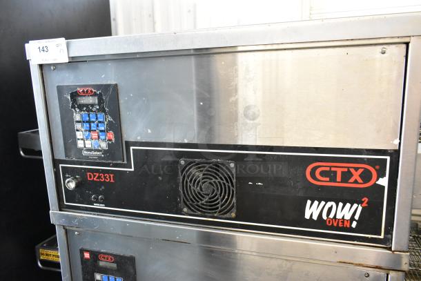 Middleby Marshall CTX DZ33I stainless steel electric conveyor pizza oven, shows control panel and casters, 208V, used.