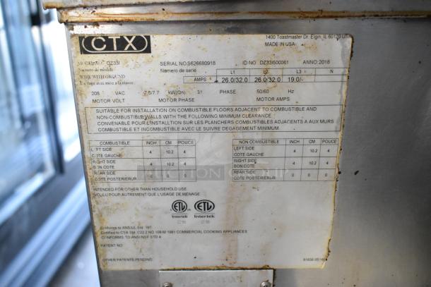 Middleby Marshall CTX DZ33I commercial pizza oven label with specifications, including model, voltage, and phase details.