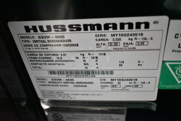Hussmann GSVM-4060 commercial reach-in merchandiser label. Model, type, specs, and serial number details visible.