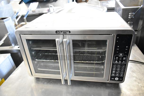Gourmia GTF7660 digital air fryer oven, metal, 120V, 1 phase. Dual doors, digital controls. Good condition.