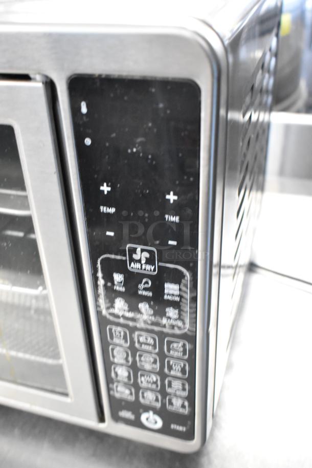 Gourmia GTF7660 metal countertop digital air fryer oven, featuring digital controls and multiple cooking presets.