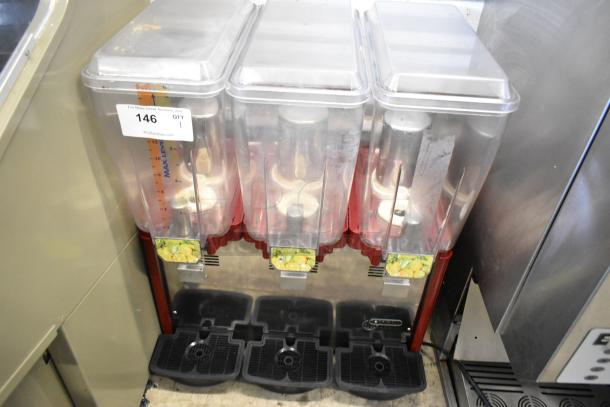 Metal commercial countertop beverage machine, 3 hoppers, refrigerated, 115 volts, 1 phase, includes visible level markings.