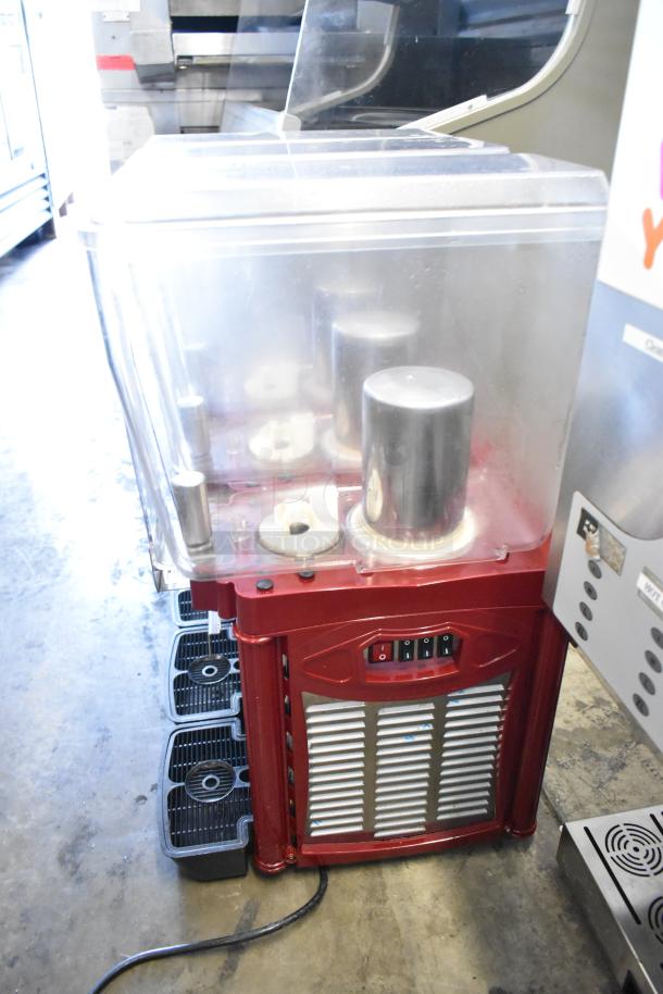 Metal commercial countertop beverage machine with 3 hoppers, 115 volts, 1 phase; features red casing and control switches.