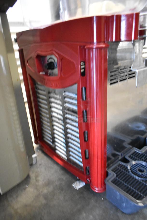 Metal commercial countertop 3 hopper refrigerated beverage machine, red trim, 115 volts, 1 phase, used condition.