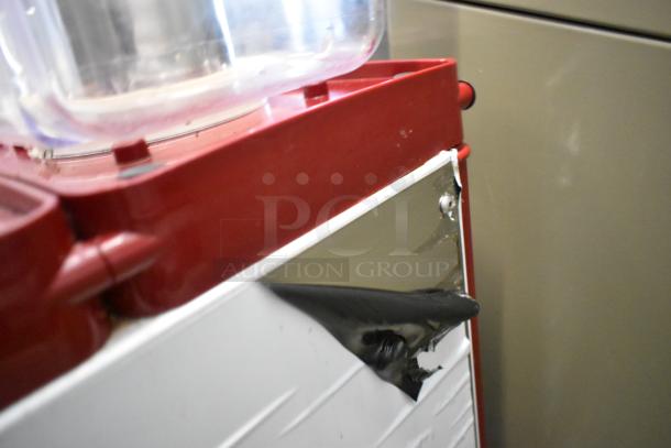 Metal commercial countertop refrigerated beverage machine with 3 hoppers, 115 volts, 1 phase, minor exterior wear.