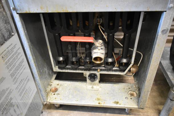 Sierra SRF-75/80-LP propane fryer, showing interior heating elements and control valve; stainless steel, used condition.