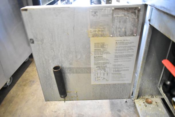 Sierra SRF-75/80-LP stainless steel propane deep fryer, 75 lb capacity, visible instructions and gas connection port.