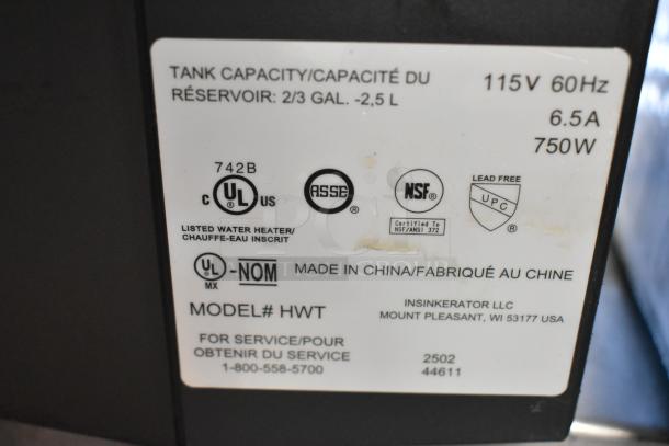 Insinkerator HWT Instant Hot Water Tank label showing model info, 115V, 60Hz, 6.5A, 750W, 2/3 gal capacity, certifications, and contact details.