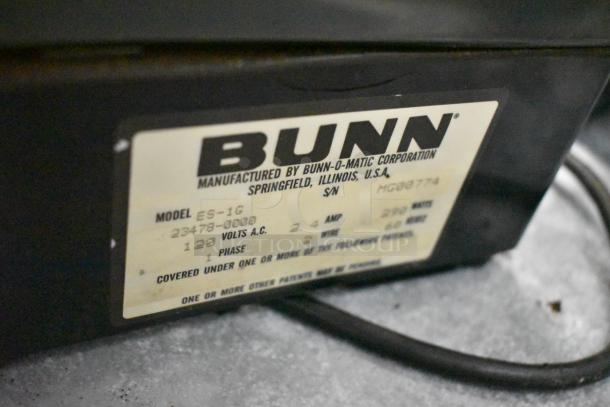 Bunn ES-1G espresso grinder label showing model, 115V, 1 phase, made in USA, Springfield, Illinois, by Bunn-O-Matic.