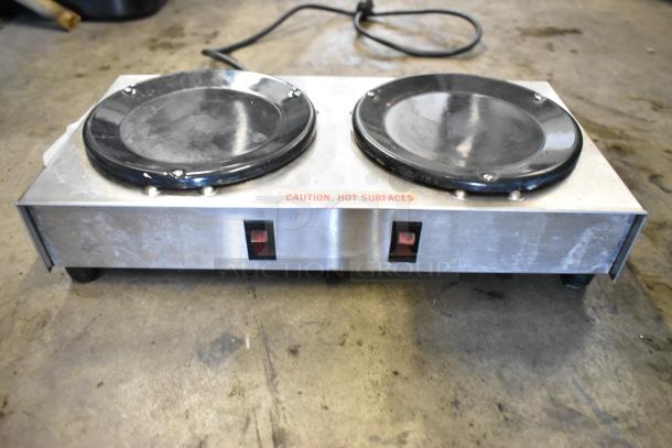 Newco X-2 metal commercial 2-burner coffee pot warmer, 120V, 1 phase, "Caution: Hot Surfaces" label, used condition.