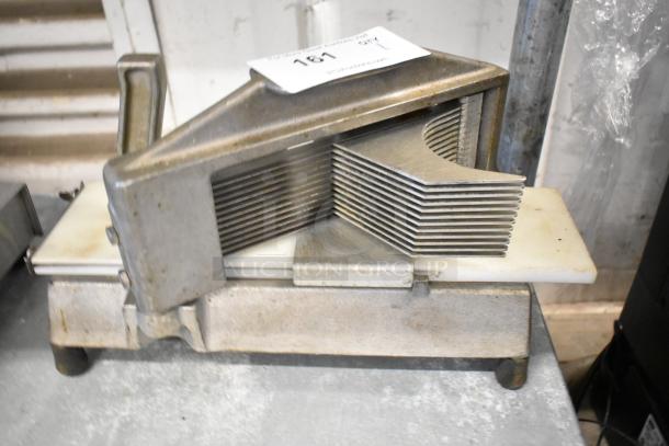 Nemco Metal Countertop Tomato Slicer, used condition, stainless steel, serrated blades, for efficient slicing, sturdy design.