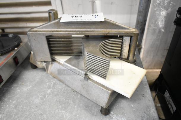 Nemco metal countertop tomato slicer with stainless steel blades, showing signs of wear, auction tag visible.