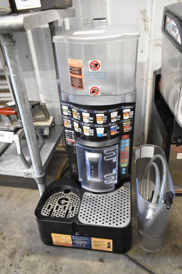 Taylor X83684-12 metal frozen drink mixing station, commercial, countertop model. Features drink selection labels, hoses included.