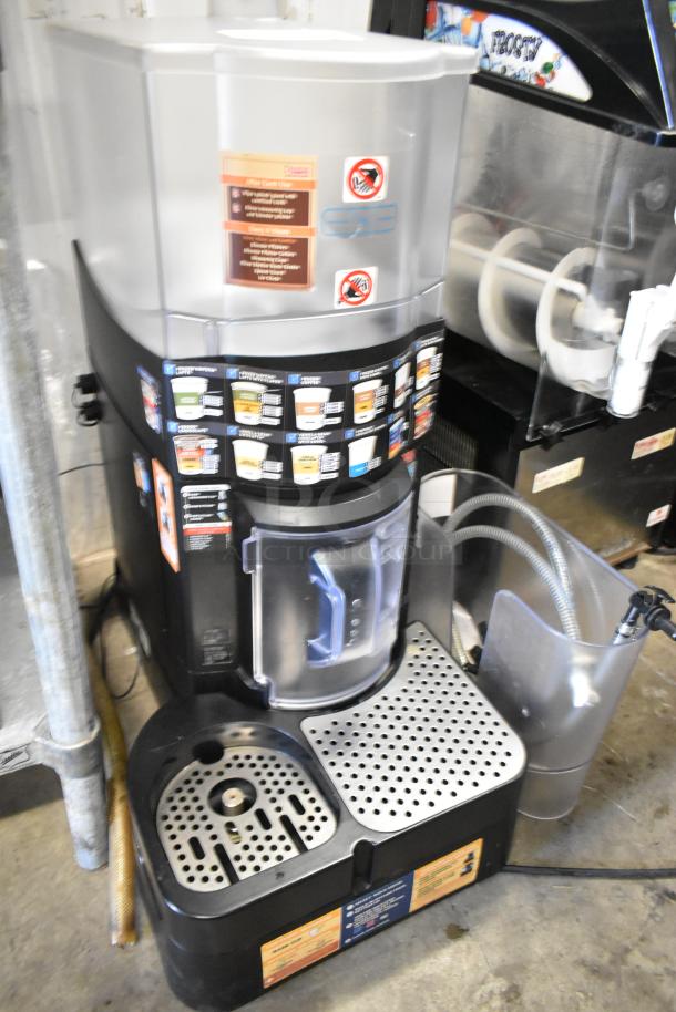 Taylor X83684-12 Metal Commercial Frozen Drink Mixer, countertop model with user instructions, features durable metal construction.
