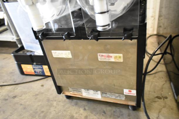 2020 SPM Frosty 2 New Metal Commercial Slushie Machine, dual hoppers, 115V, 1 phase. Labels visible, stainless exterior.