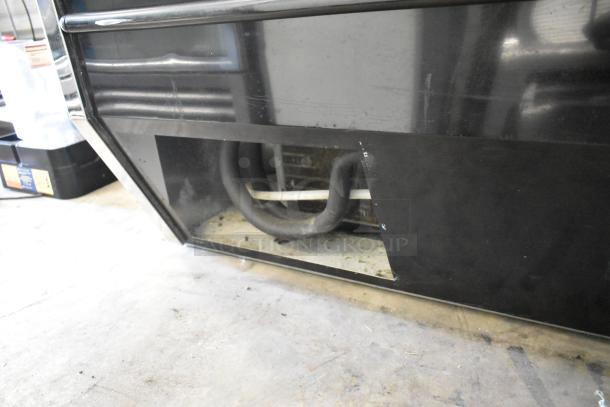 McCray metal commercial deli display case, floor model, 115V, 1 phase, black finish, minor surface wear visible.