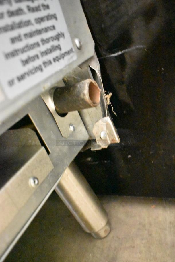 2024 Avantco 177CAG36MG stainless steel natural gas griddle detail; commercial use, visible hardware and metal components.