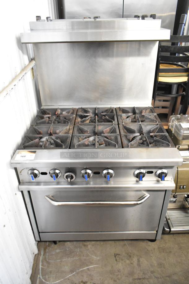 2024 Hangzhou stainless steel 6-burner gas range with oven, over shelf, back splash, on commercial casters. Excellent condition.