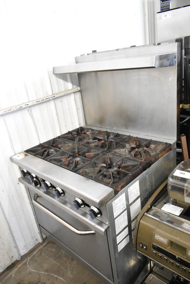 2024 Hangzhou stainless steel 6 burner gas range with oven, over shelf, backsplash, on commercial casters.