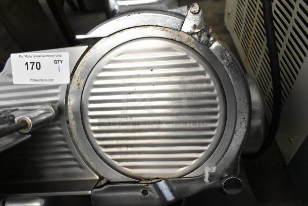 Globe 715 metal meat slicer with blade sharpener, 115V, 1 phase, commercial countertop model; visible wear, auction tag reads "170".