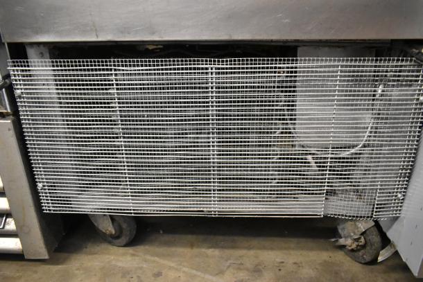 True T-23F Stainless Steel Reach-In Freezer, commercial casters visible, 115V, 1 Phase, sturdy condition.