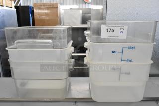Lot of 6 Cambro poly bins, clear plastic, marked with liter/quart measurements, varying sizes, used condition.