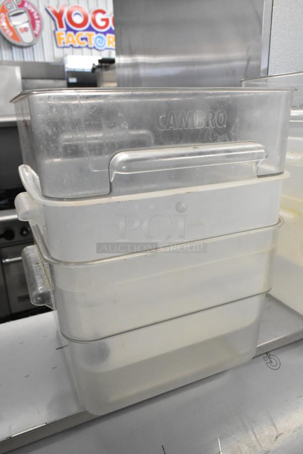 Lot of 6 Cambro poly bins, clear, stackable, with handles. Good condition, suitable for storage or organizing.