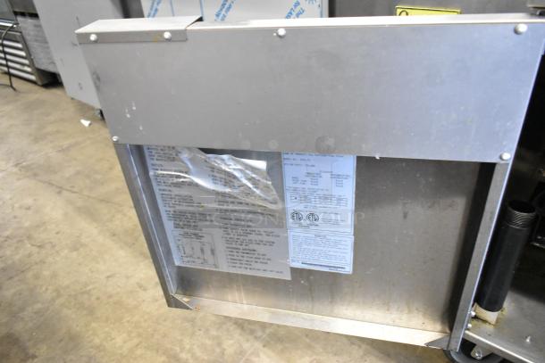 Cook Rite ATFS-75 stainless steel commercial deep fat fryer, natural gas, 170,000 BTU, on casters with 3 fry baskets, visible labels.