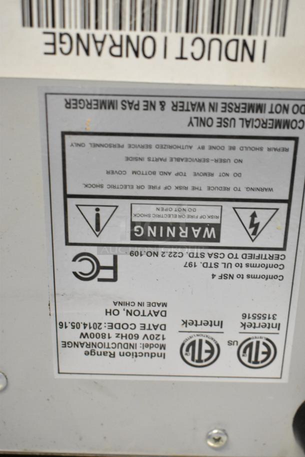 Centaur InductionRange label showing model details, 120V, 1800W. Warning labels and certifications visible.