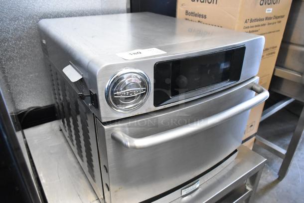 2017 Turbochef Encore2 stainless steel rapid cook oven on stand, 208/240V, 1 phase. Features digital display, knob, and handle.